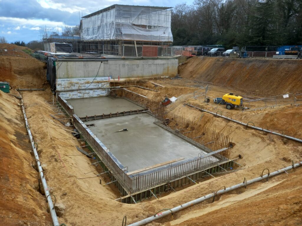 Pouring concrete Brent Hall, Essex