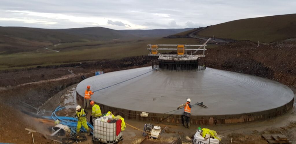 Dorenell Wind Farm construction of wind turbine base showing concrete and steel fixing