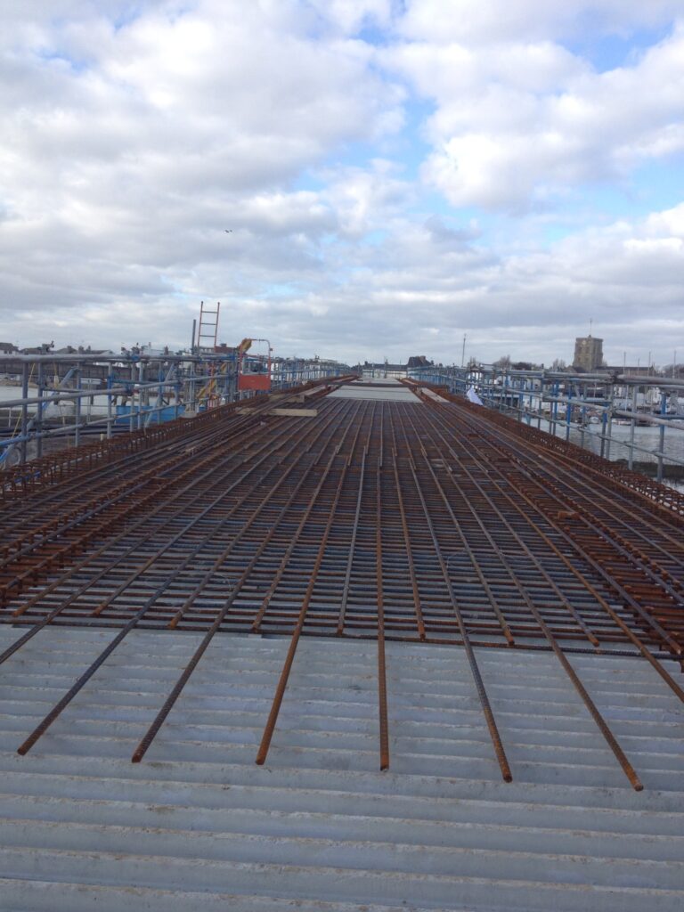 Construction on Shoreham Footbridge showing exposed rebar before concrete pouring